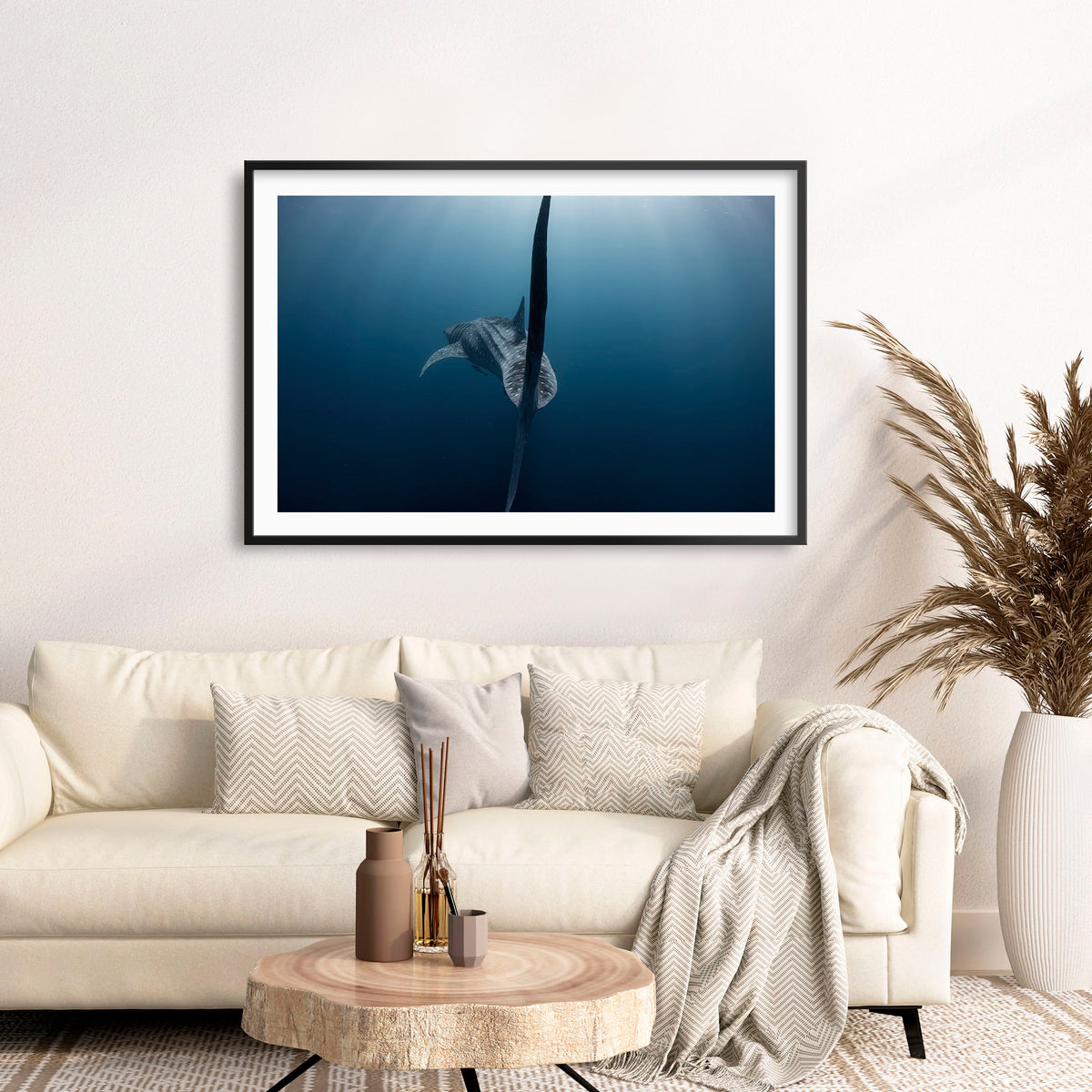 Room mockup above a sofa: A Sharks tale — whale shark tail beneath the ocean surface.