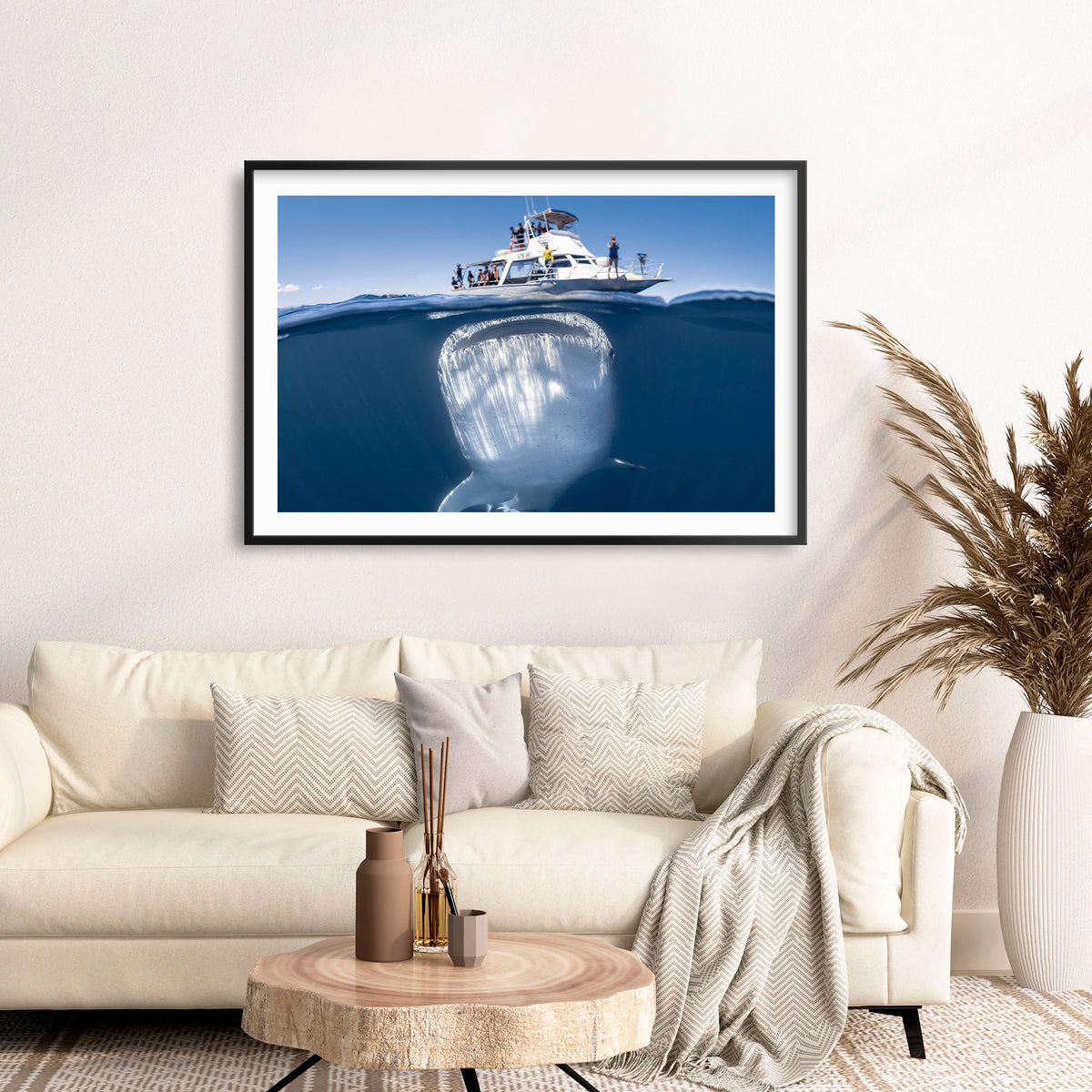 Room mockup above a sofa: We're gonna need a bigger boat — split-level view of a whale shark beneath a boat.